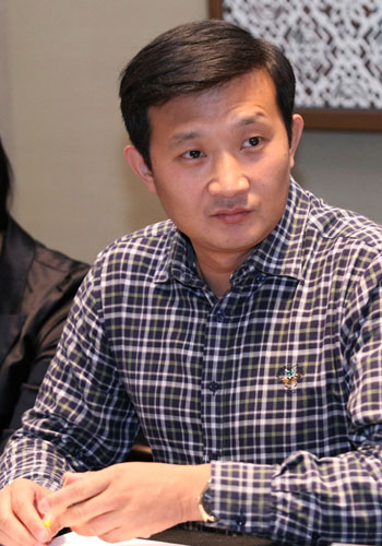 btv资深记者艾军出席圆桌会议